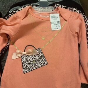 4 onesies. 3 long sleeve & 1 short sleeve. 3 leggings including jeans. Brand new